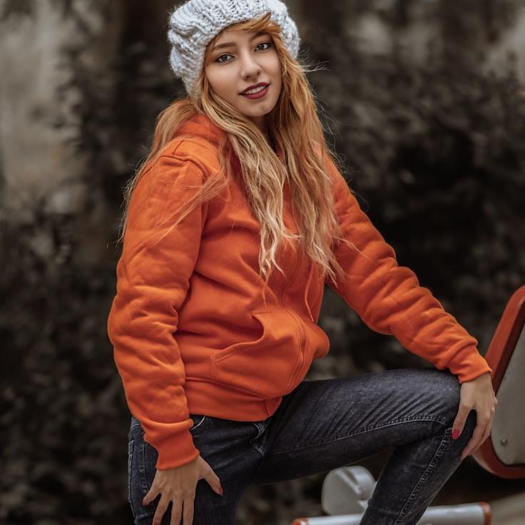 Alex Carter, Lead Design Curator at Field Haven Calm, reviewing corporate floral arrangements